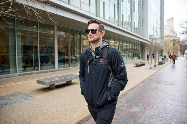 MIT Sloan MBA student David Brown, the co-founder of Helix Carbon, walks through Kendall Square in Cambridge, Massachusetts.