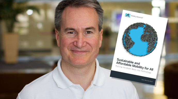 Portrait of Dr. Borroni-Bird with the cover of his book