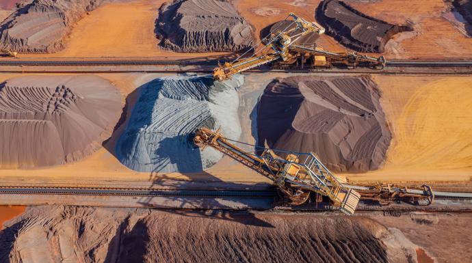Large machinery at work in a metal mine.